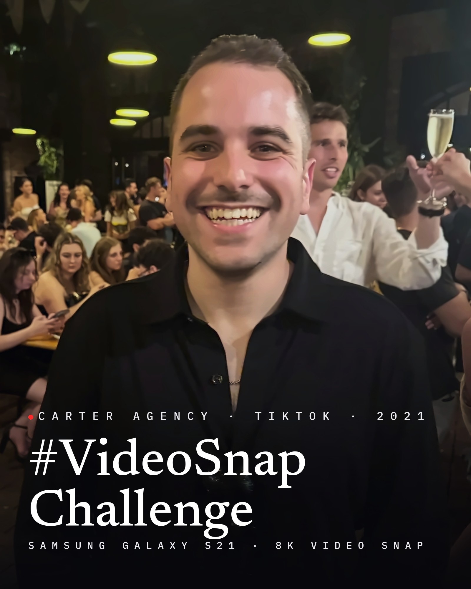 Josh Popkin, founder of Carter Agency, smiling at an evening event, with the title #VideoSnapChallenge