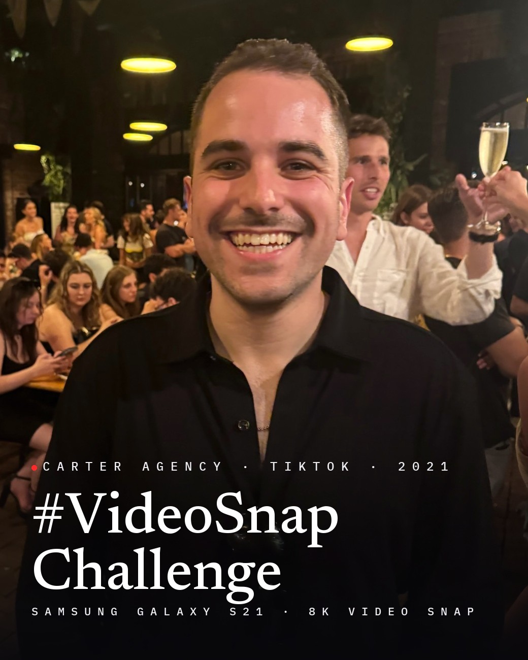 Josh Popkin, founder of Carter Agency, smiling at an evening event, with the title #VideoSnapChallenge